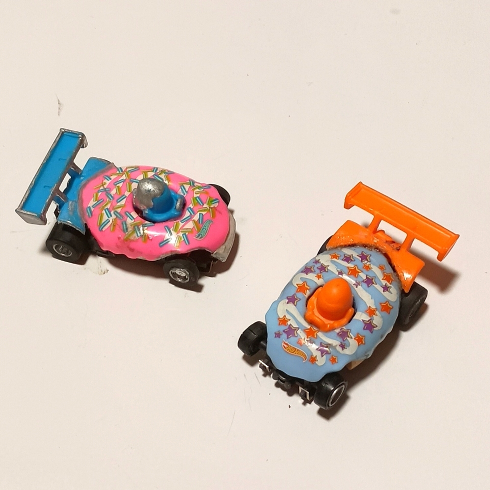 His and hers blue and pinkAFX donut race cars (Rare) custom made